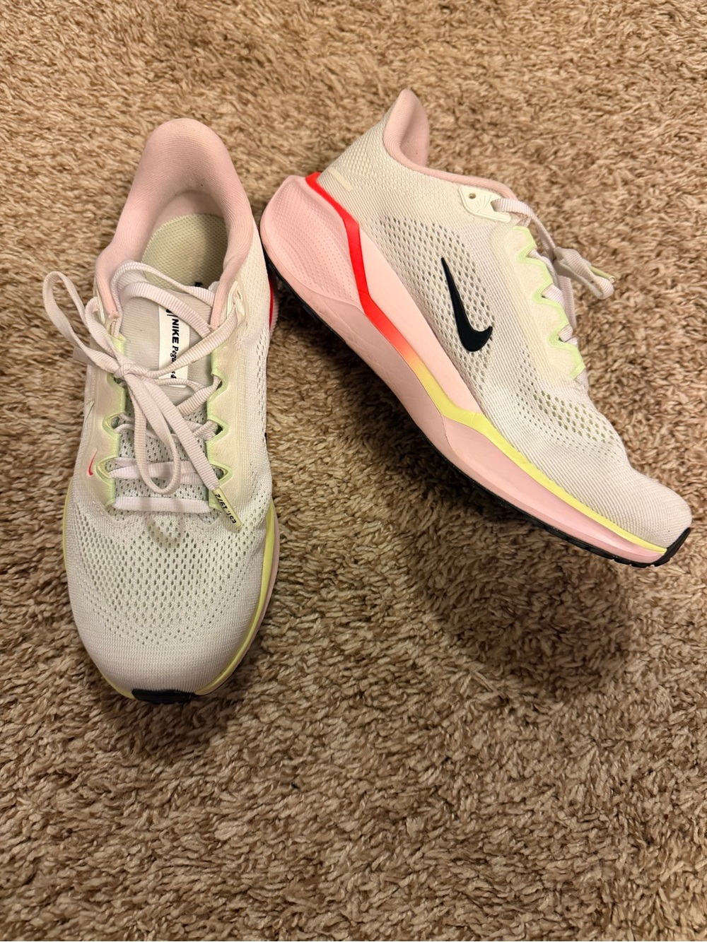Nike Women’s Cream Running Shoes with Pink and Yellow Accents